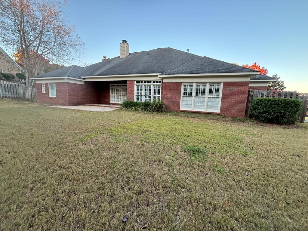 8001 Adelaide Drive Columbus, GA 31909 - Photo 31 of 36 front view of a house with a yard