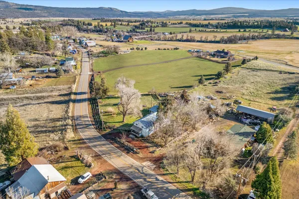 an aerial view of ocean with residential house and ocean view