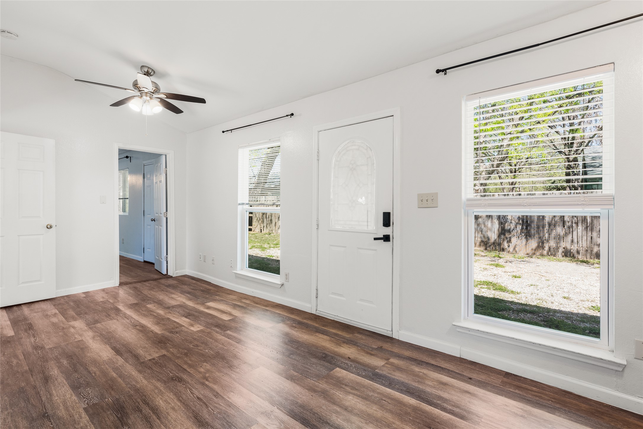 1116 Ebert Avenue, Unit B Austin, TX 78721 - Photo 11 of 28 a view of empty room with wooden floor and fan