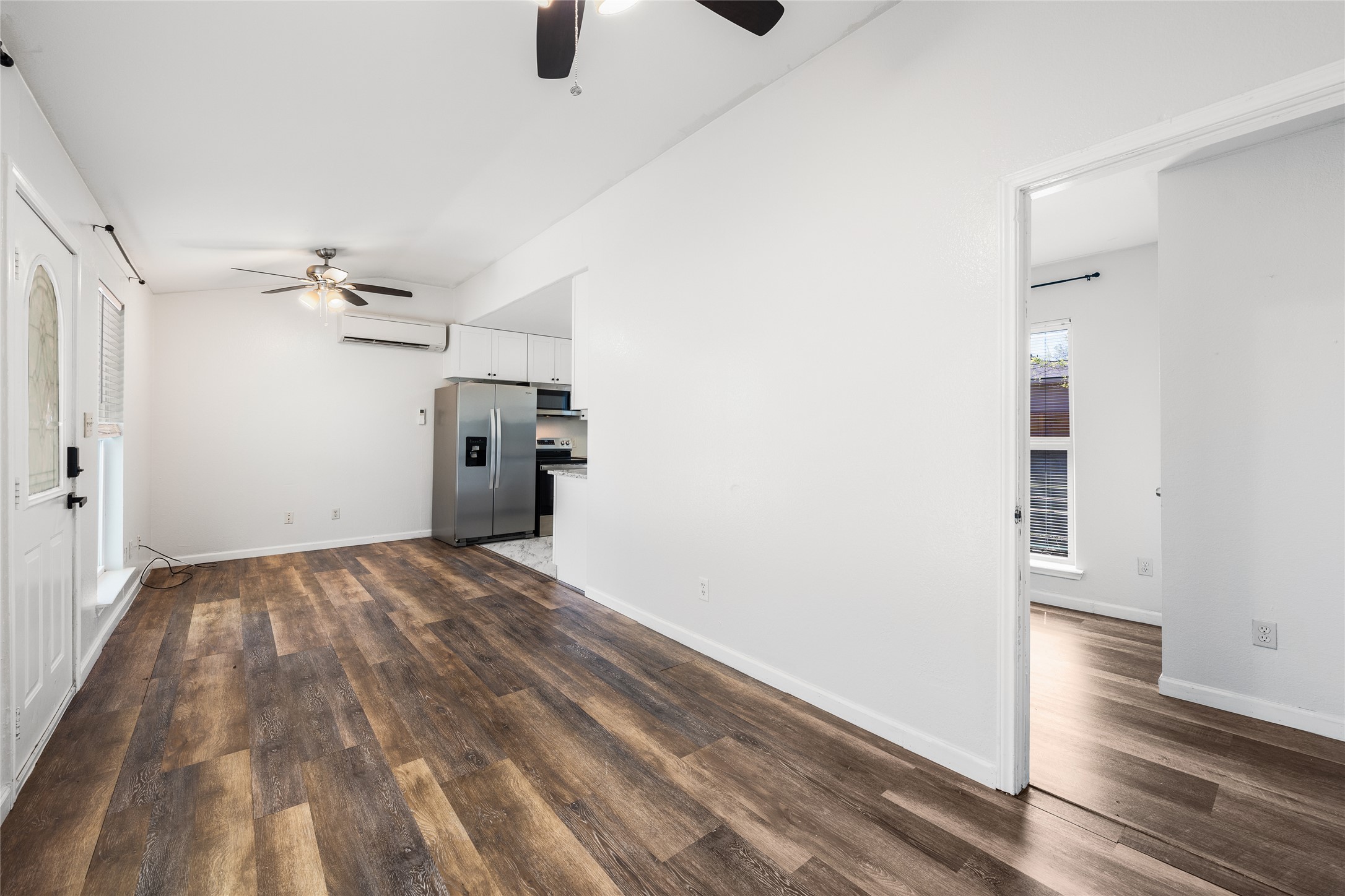 1116 Ebert Avenue, Unit B Austin, TX 78721 - Photo 9 of 28 a view of empty room with wooden floor