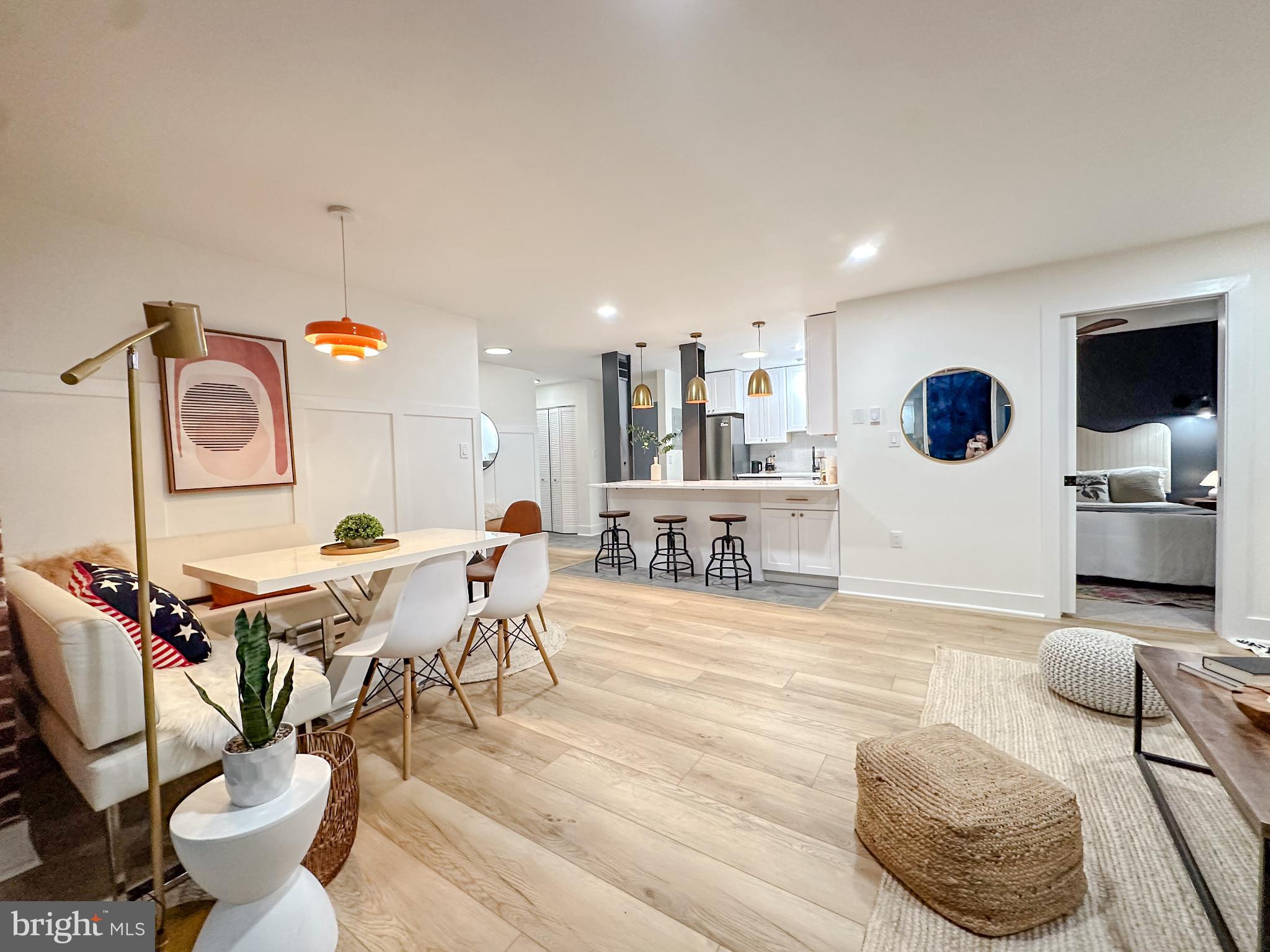 3245 Rio Drive, Unit 206 Falls Church, VA 22041 - Photo 17 of 36 a living room with furniture and a flat screen tv