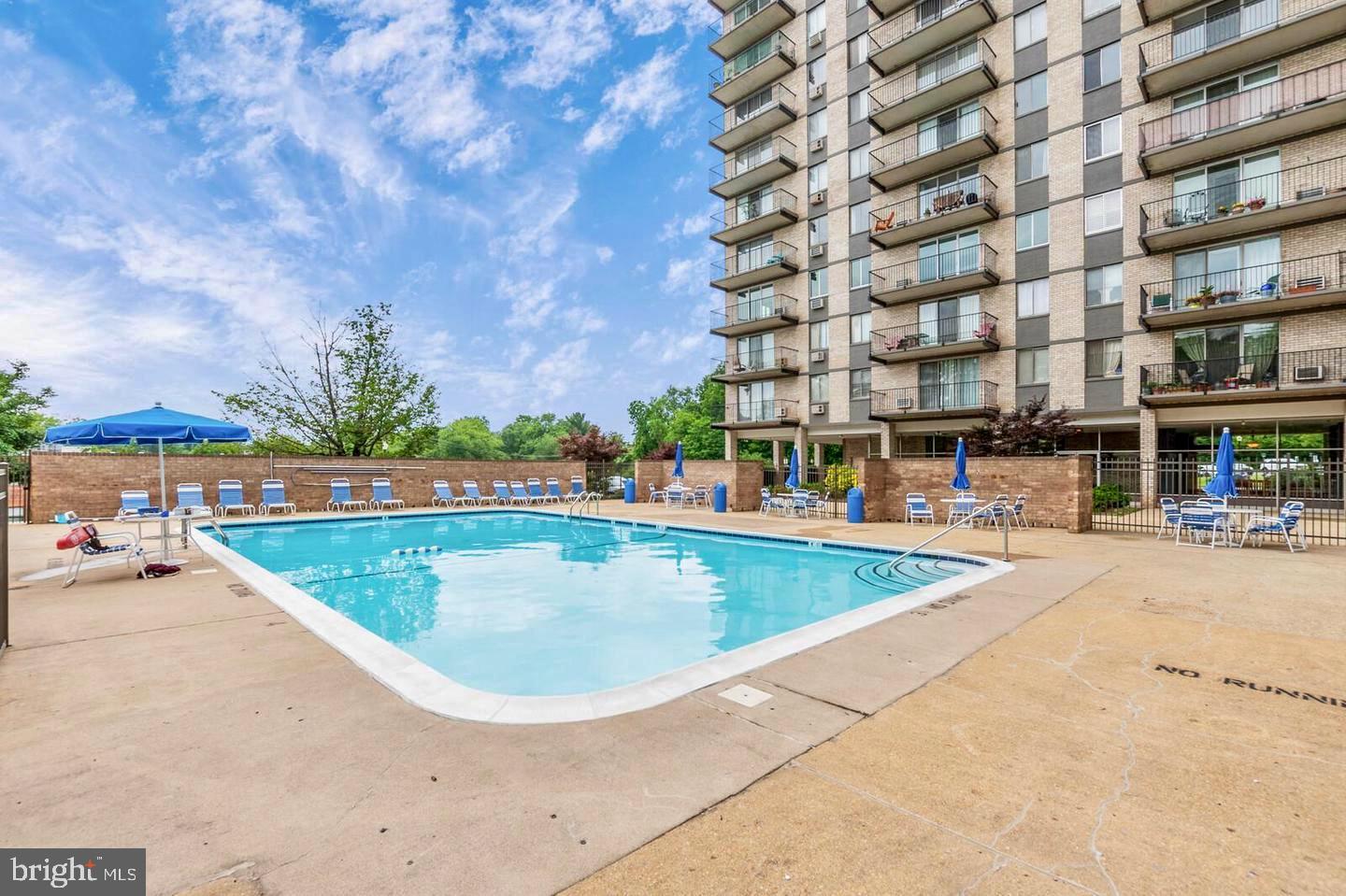 3245 Rio Drive, Unit 206 Falls Church, VA 22041 - Photo 28 of 36 a view of a swimming pool and a outdoor space