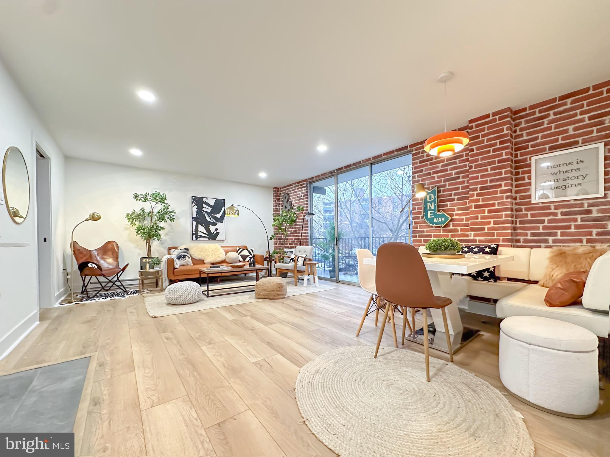 3245 Rio Drive, Unit 206 Falls Church, VA 22041 - Photo 3 of 36 a living room with furniture