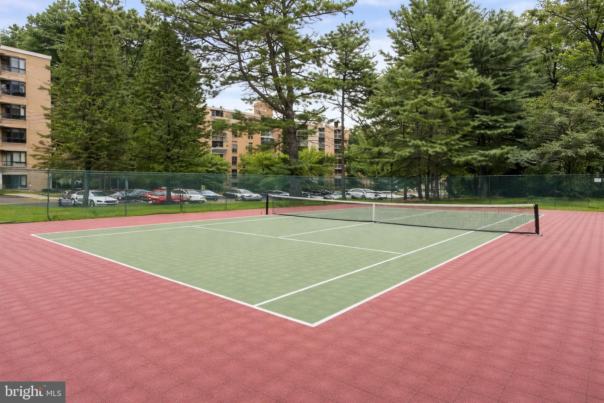 3245 Rio Drive, Unit 206 Falls Church, VA 22041 - Photo 35 of 36 a view of an outdoor space and tennis court