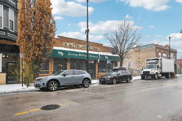 a view of a cars parked in front of a building