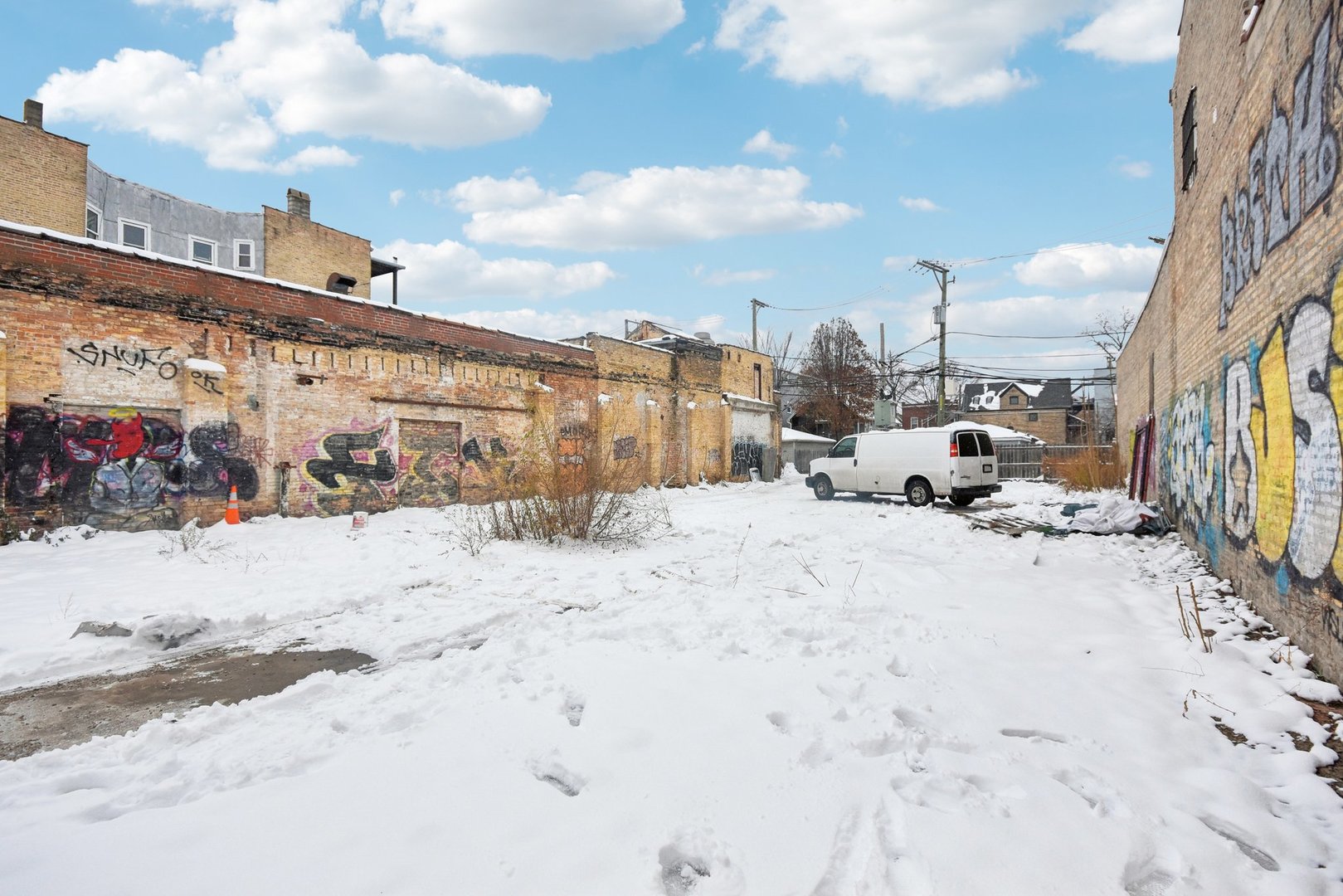 3212 West Armitage Avenue Chicago, IL 60647 - Photo 4 of 9 a view of a road with a building in the background