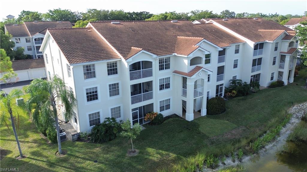 4650 St Croix Lane, Unit 731 Naples, FL 34109 - Photo 25 of 29 a aerial view of multiple houses