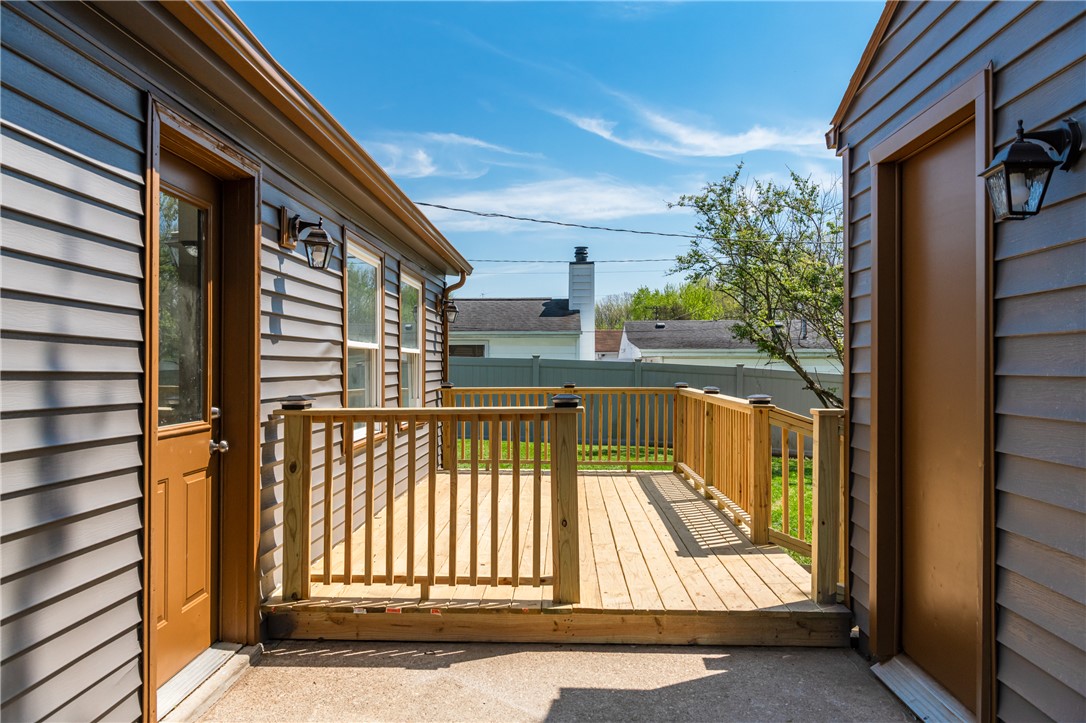 5240 Haverfield Road Dayton, OH 45432 - Photo 48 of 58 Enjoy outdoor living on this inviting wooden deck, perfect for relaxation and entertaining.