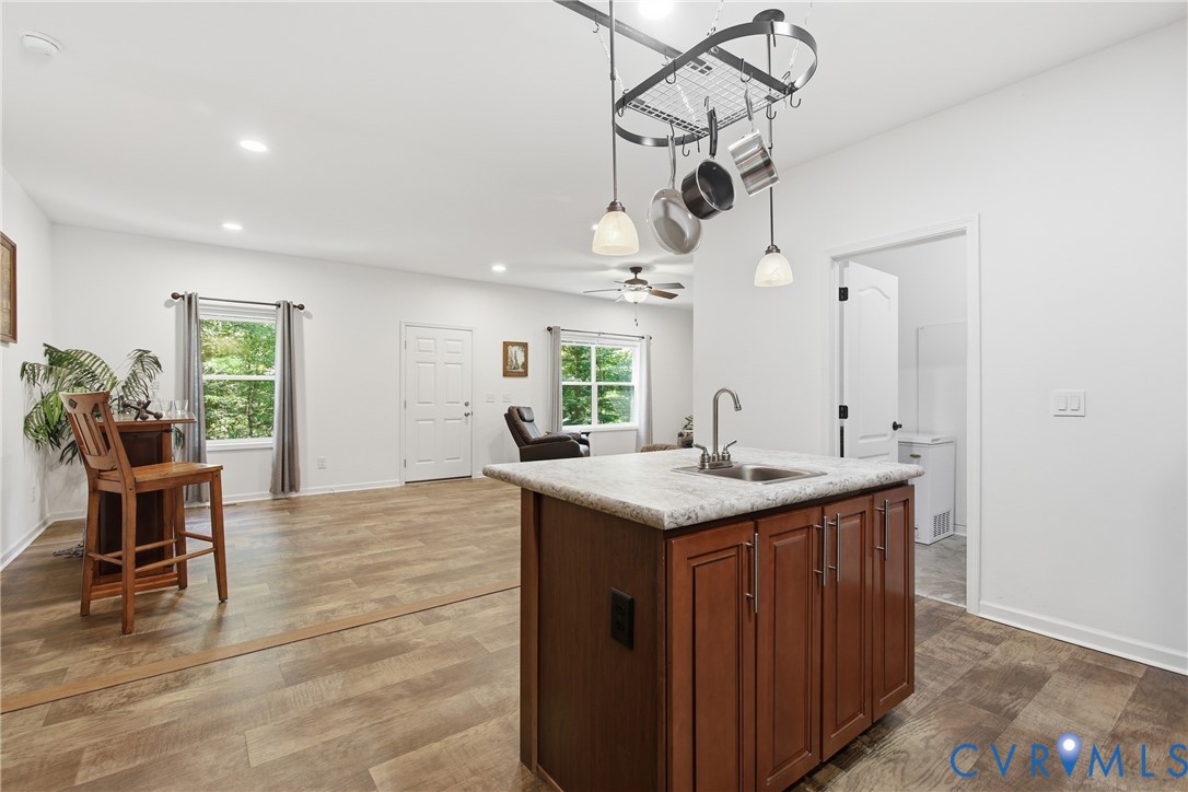 2575 Log Cabin Road Maidens, VA 23102 - Photo 15 of 36 Kitchen island with integrated sink, wood-finish f