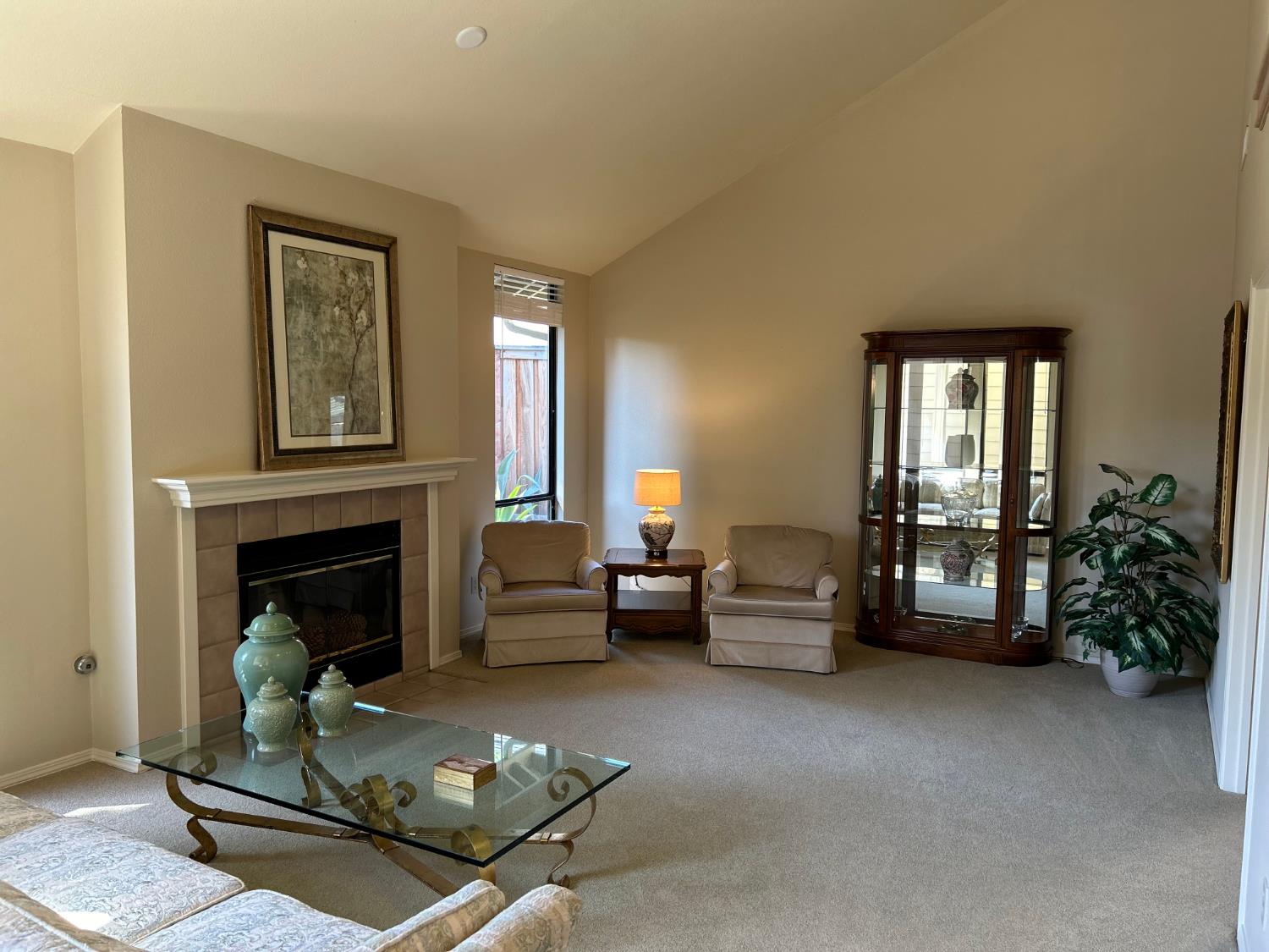 1067 Rio Cidade Way Sacramento, CA 95831 - Photo 7 of 33 a living room with furniture and a fireplace