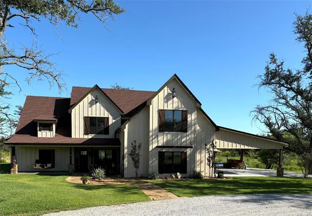 a bedroom with a bed and a fireplace