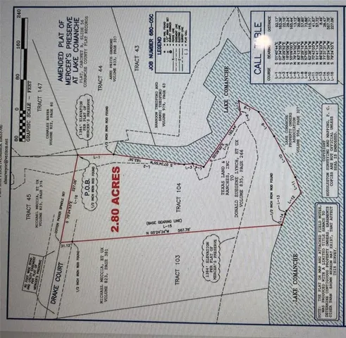 a kitchen with lots of counter top space and a wooden floor