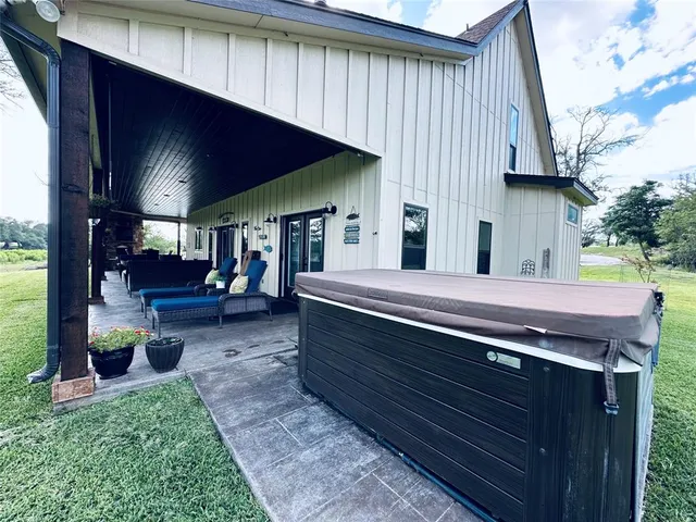 a backyard of a house with lots of green space