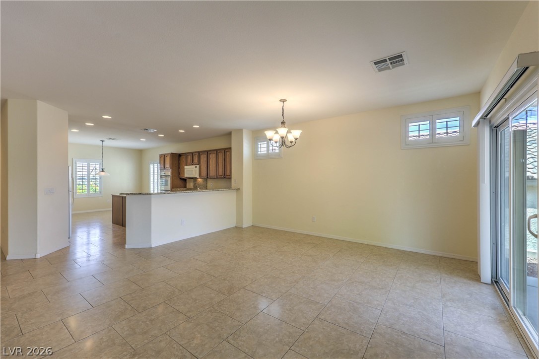 2276 Saxtons River Road Henderson, NV 89044 - Photo 5 of 49 Formal Dining Area with Tile Flooring