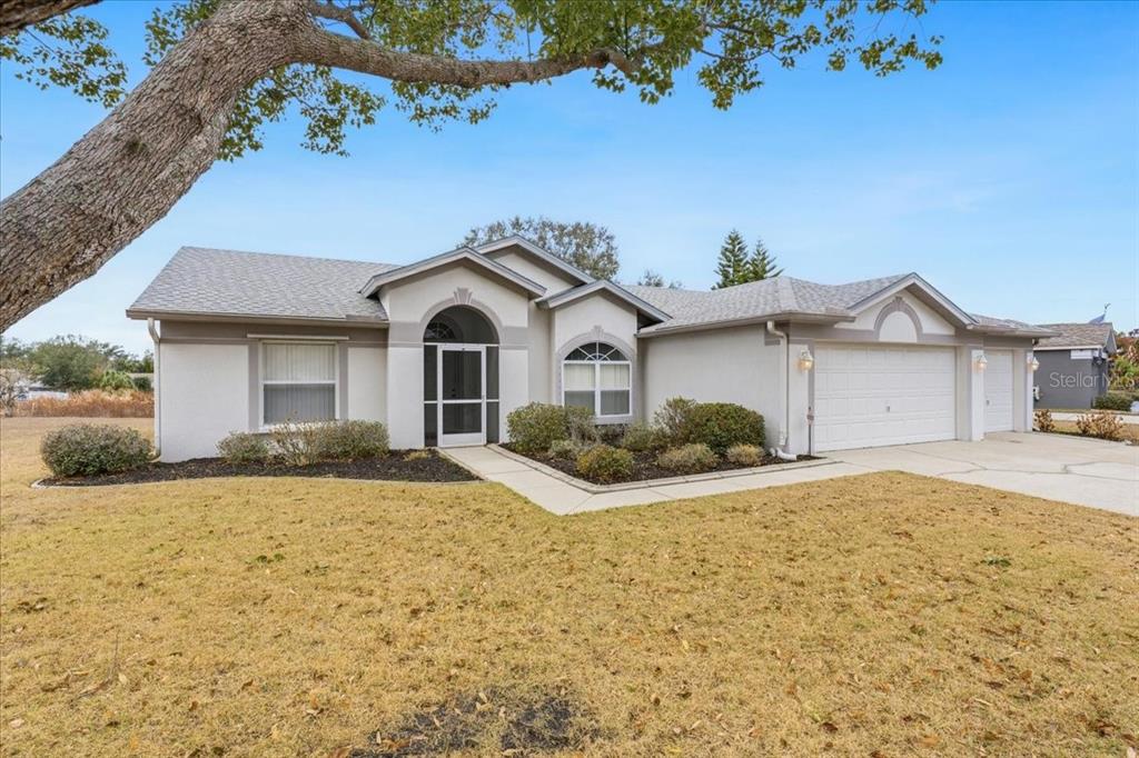 10615 Foxcrest Way Riverview, FL 33569 - Photo 1 of 1 a front view of a house with a yard and garage