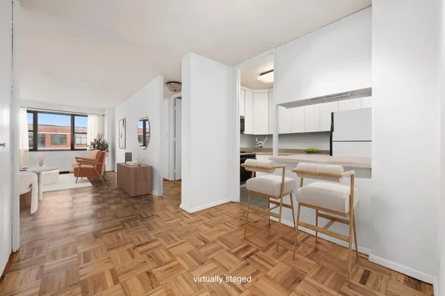 a kitchen with a stove and a refrigerator