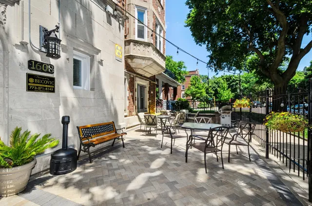a living room with furniture window and wooden floor