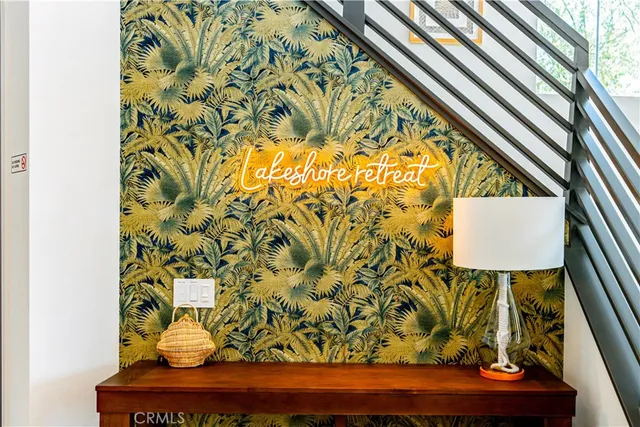 a utility room with sink dryer and washer