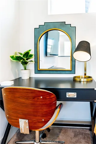 a view of a bathroom with a sink and a window