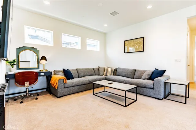 a bathroom with a shower sink and mirror
