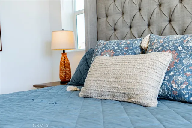 swimming pool view with a swimming pool and furniture