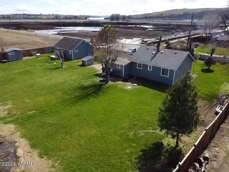 1451 Outlook Road Outlook, WA 98938 - Photo 25 of 27 an aerial view of a house with a garden and lake view