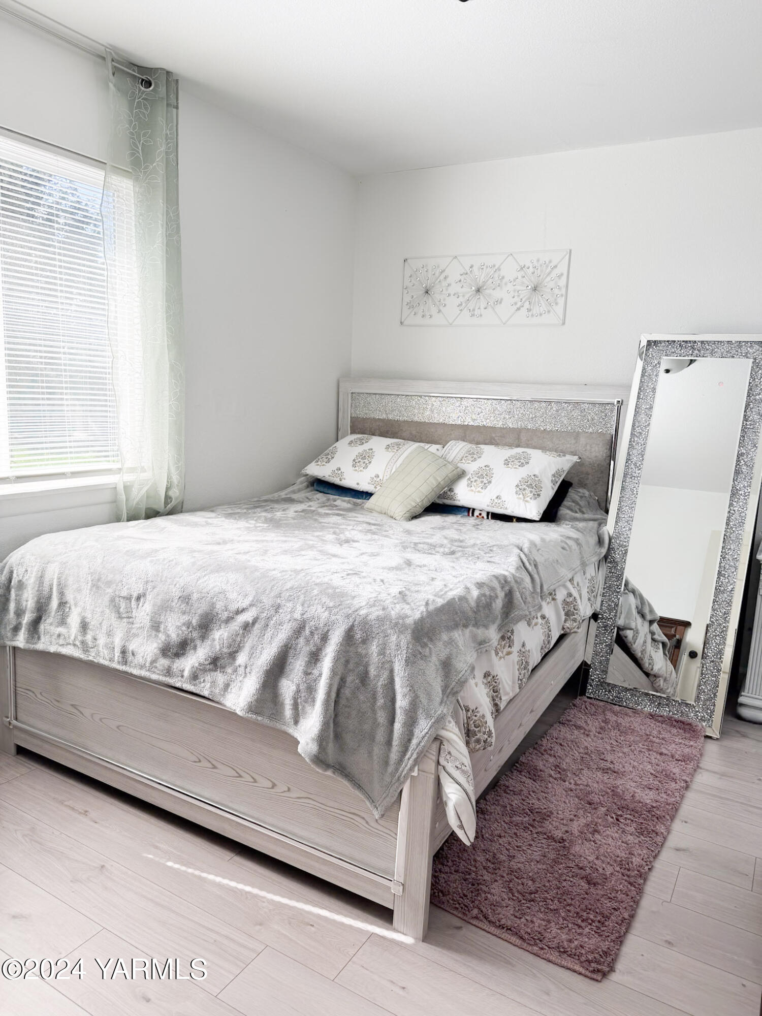1451 Outlook Road Outlook, WA 98938 - Photo 7 of 27 a bedroom with a bed and mirror