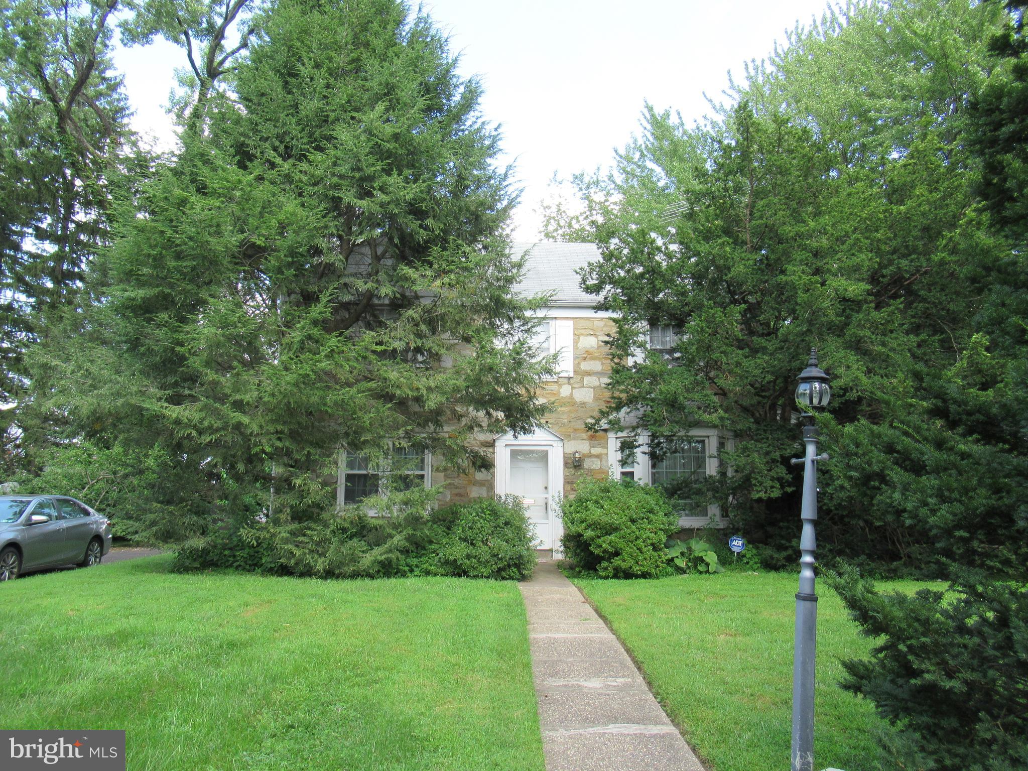 101 Dewey Road Cheltenham, PA 19012 - Photo 1 of 37 Front view of the stone colonial