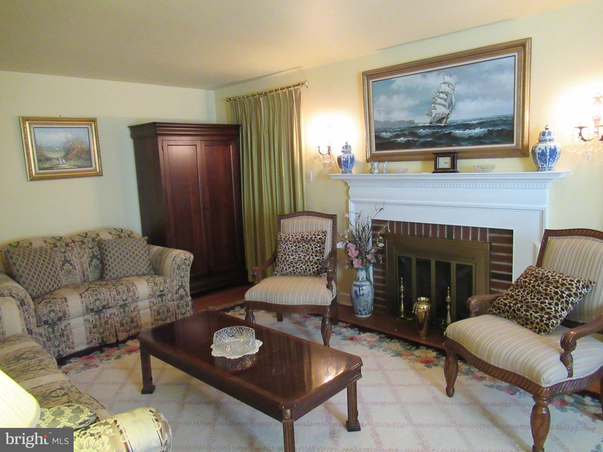 101 Dewey Road Cheltenham, PA 19012 - Photo 2 of 37 Living room with wood burning fireplace
