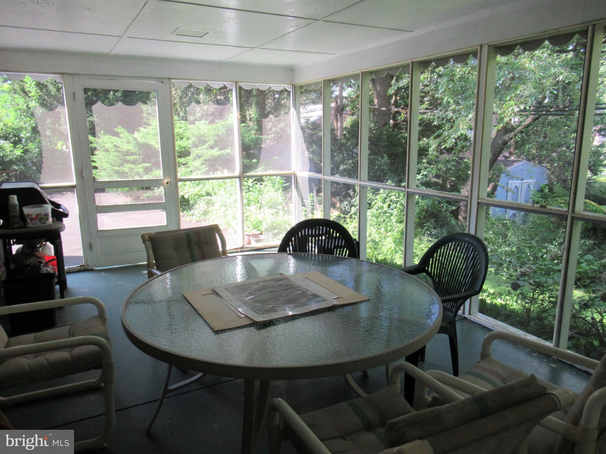 101 Dewey Road Cheltenham, PA 19012 - Photo 12 of 37 Screened in porch with two exits