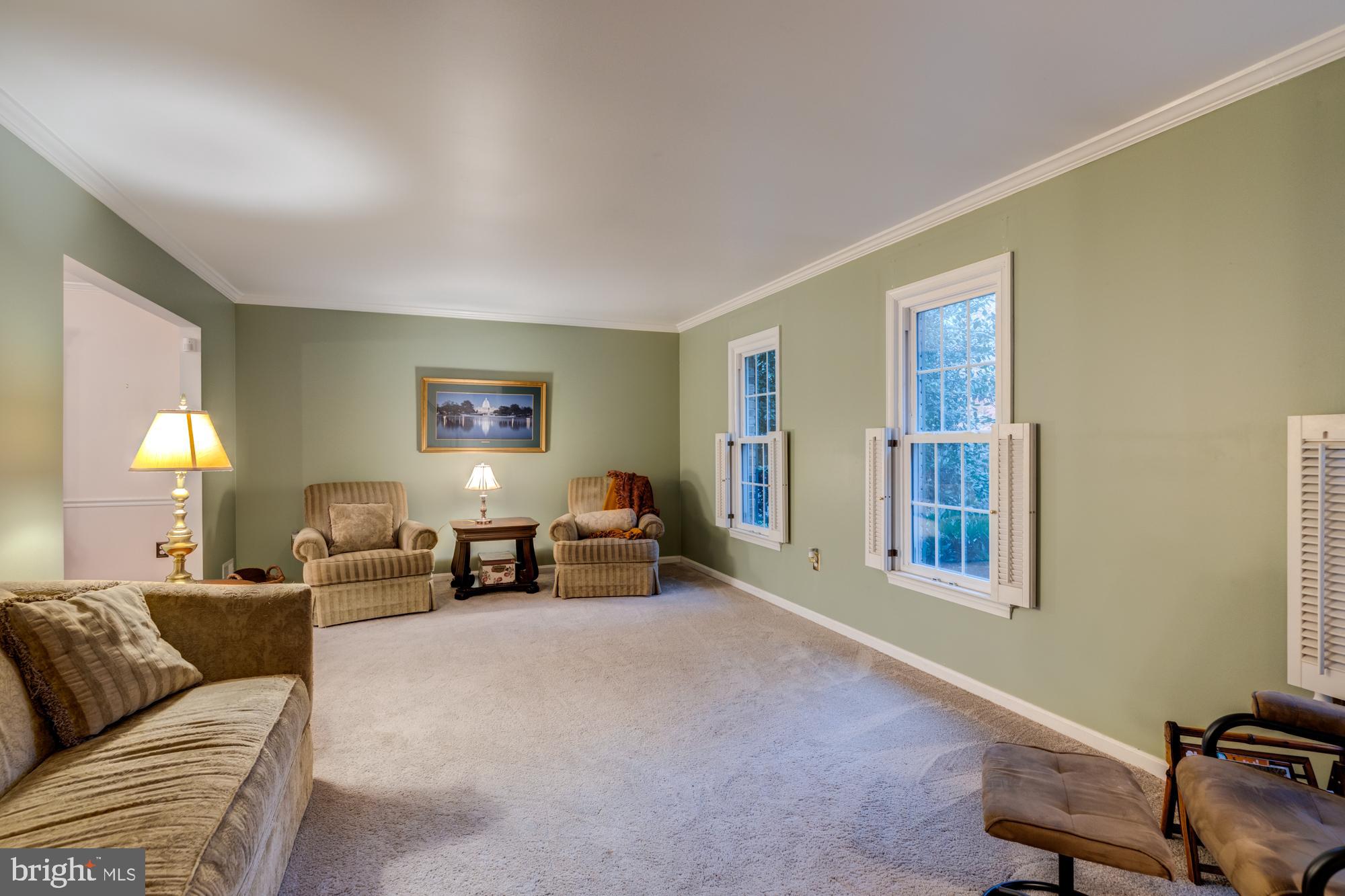 8116 Northumberland Road Springfield, VA 22153 - Photo 16 of 54 Spacious formal living area with window shutters