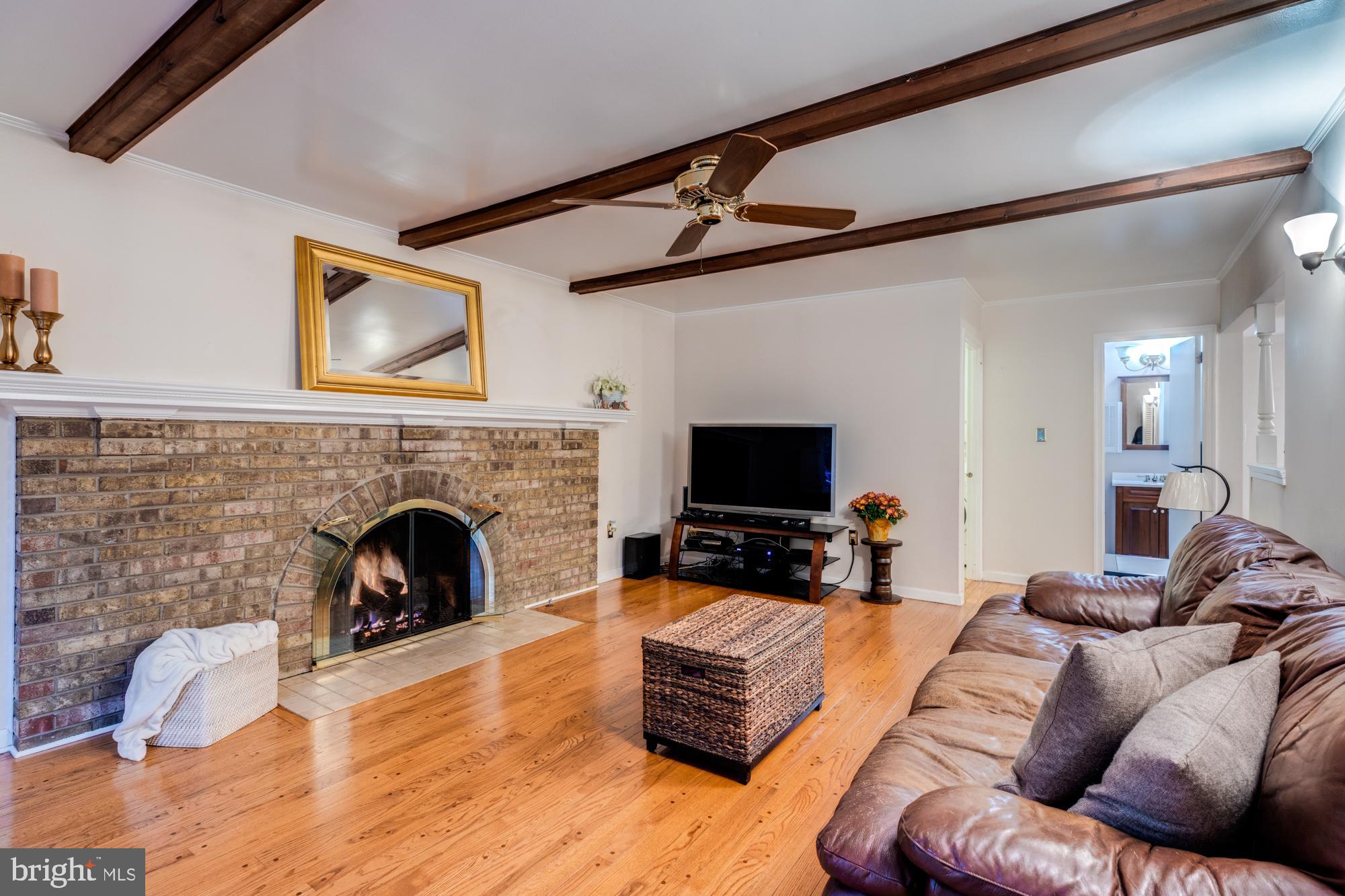 8116 Northumberland Road Springfield, VA 22153 - Photo 19 of 54 Amazing family room with dramatic brick fireplace