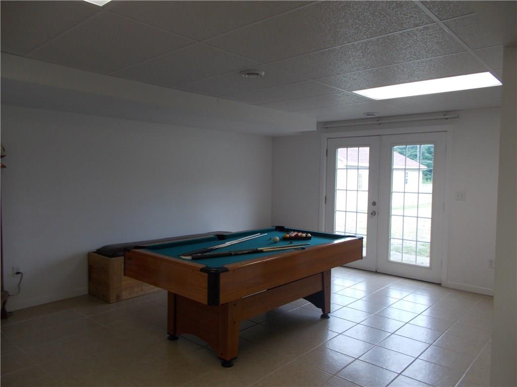 124 Currie Road Slippery Rock, PA 16057 - Photo 16 of 25 This area has been used for many purposes. Would make an ideal mother-in-law suite, an in-home office, or multi-use game room.