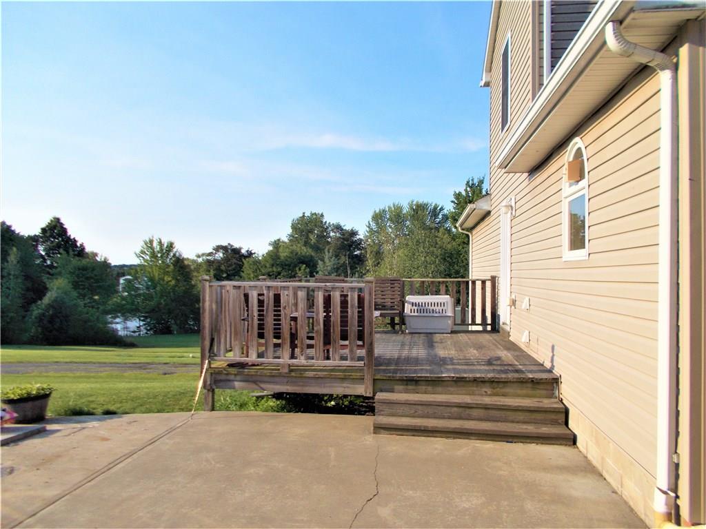 124 Currie Road Slippery Rock, PA 16057 - Photo 19 of 25 Rear Deck, outdoor patio, and attached carport all provide great areas for outdoor entertaining.