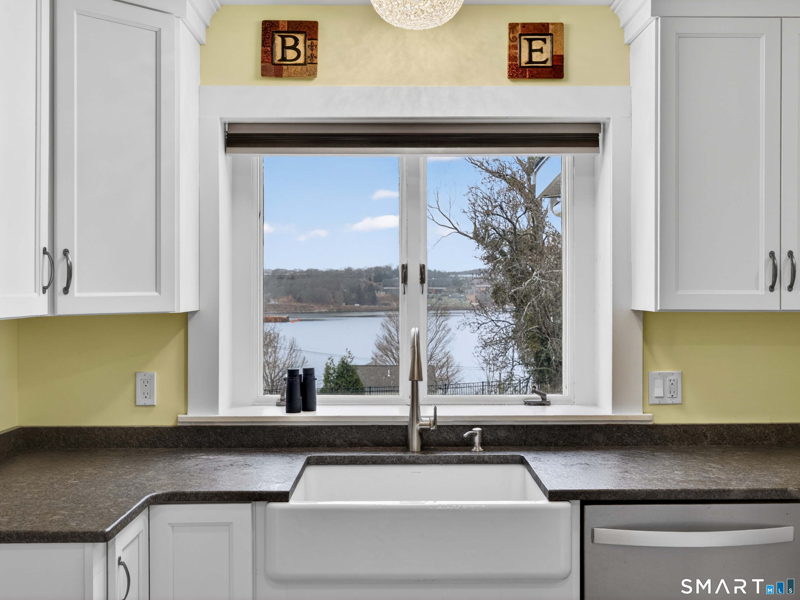 76 Starr Hill Road Groton, CT 06340 - Photo 11 of 40 a kitchen with a sink and a large window