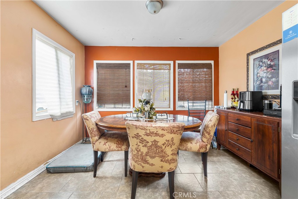 10004 San Fernando Road Pacoima, CA 91331 - Photo 4 of 12 a dining room with furniture and window