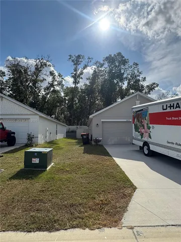 a childrens park with lots of swings and slides
