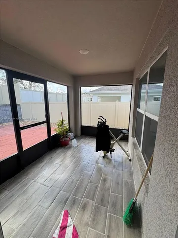 a bedroom with bed and tv