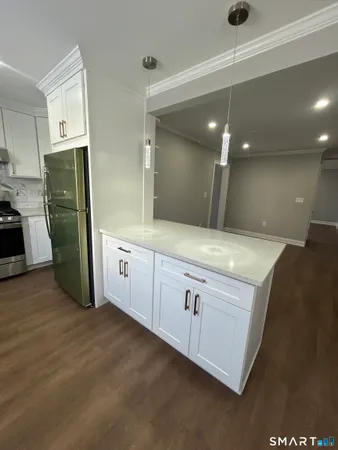 a view of a kitchen with a sink
