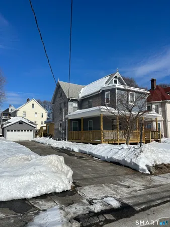 a front view of a house with a ocean view