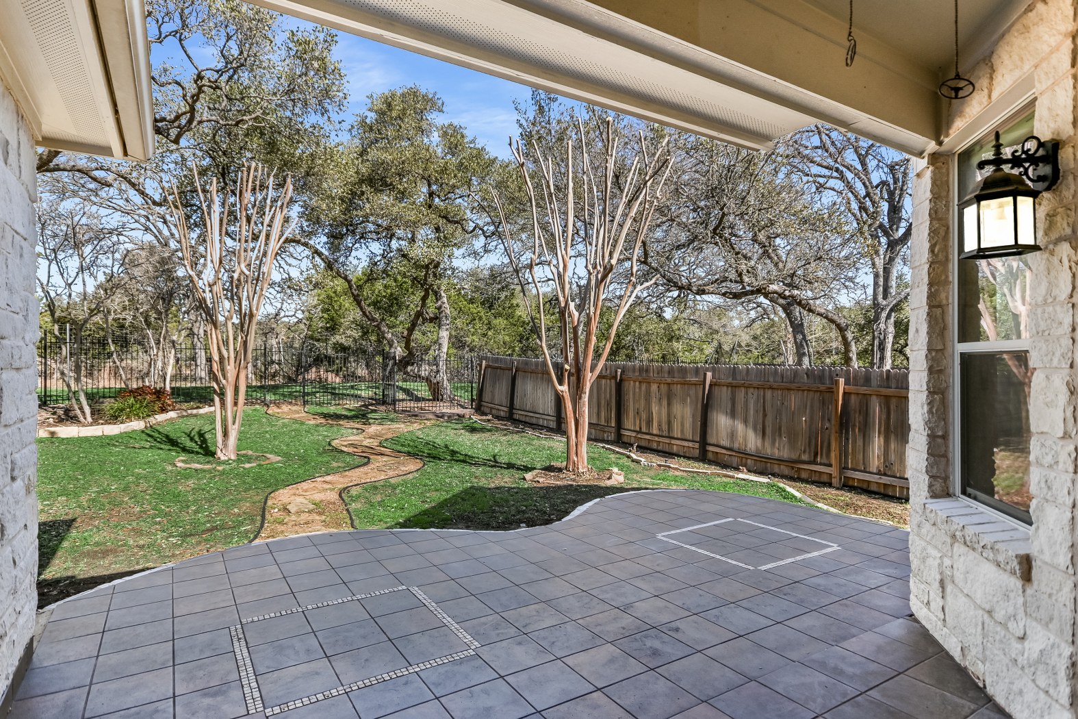 7416 Brecourt Manor Way Austin, TX 78739 - Photo 16 of 21 a view of a backyard with pathway