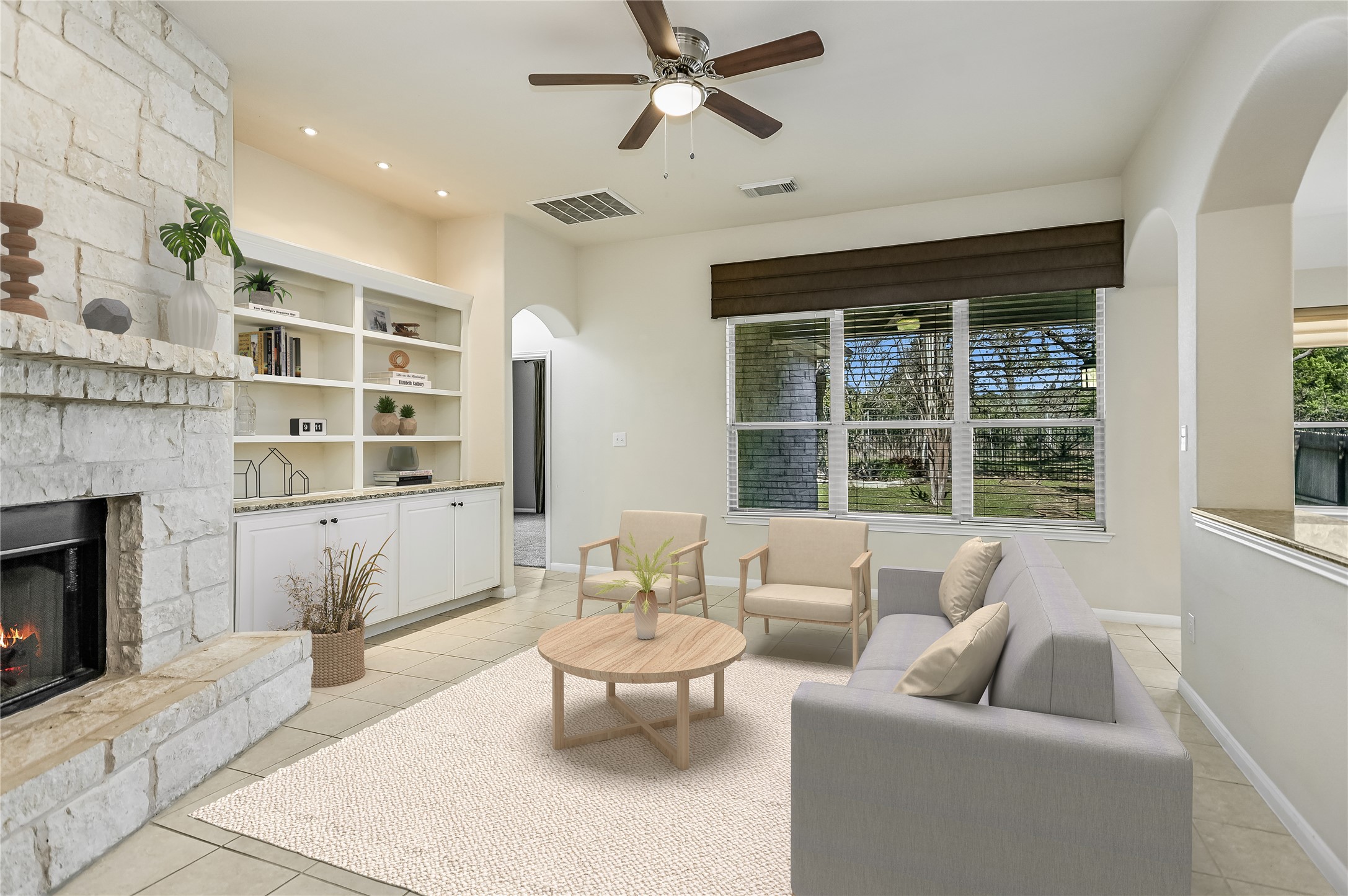 7416 Brecourt Manor Way Austin, TX 78739 - Photo 5 of 21 a living room with furniture and a fireplace