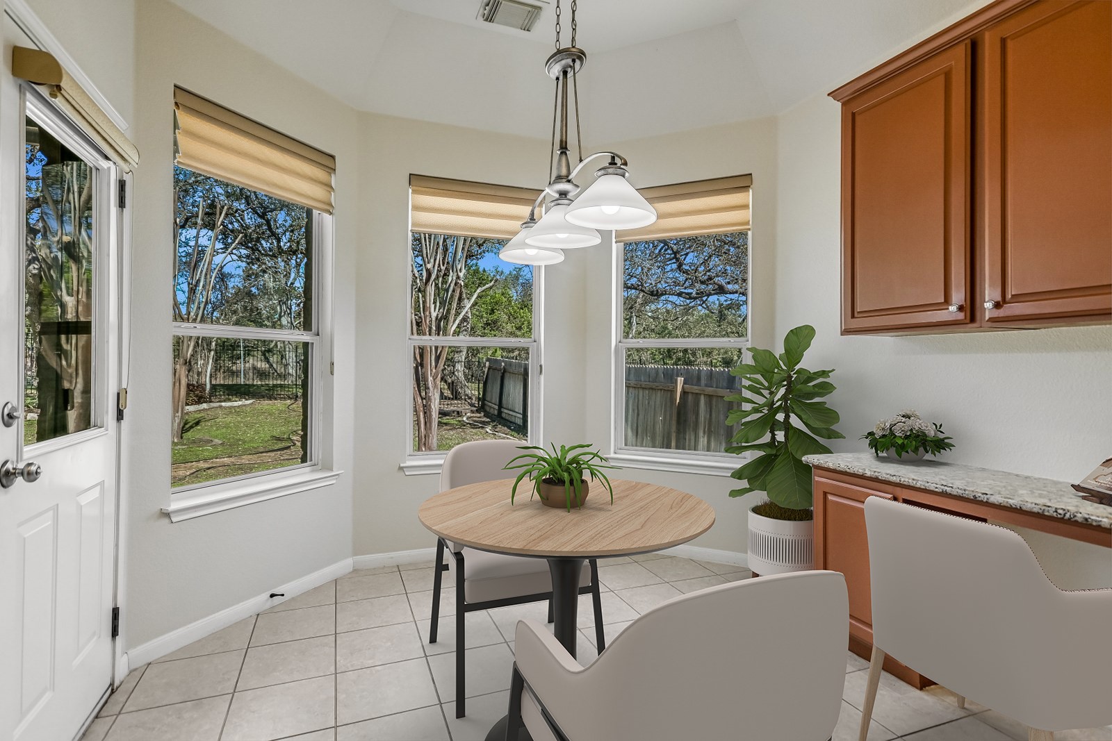 7416 Brecourt Manor Way Austin, TX 78739 - Photo 8 of 21 a dining room with furniture window and wooden floor