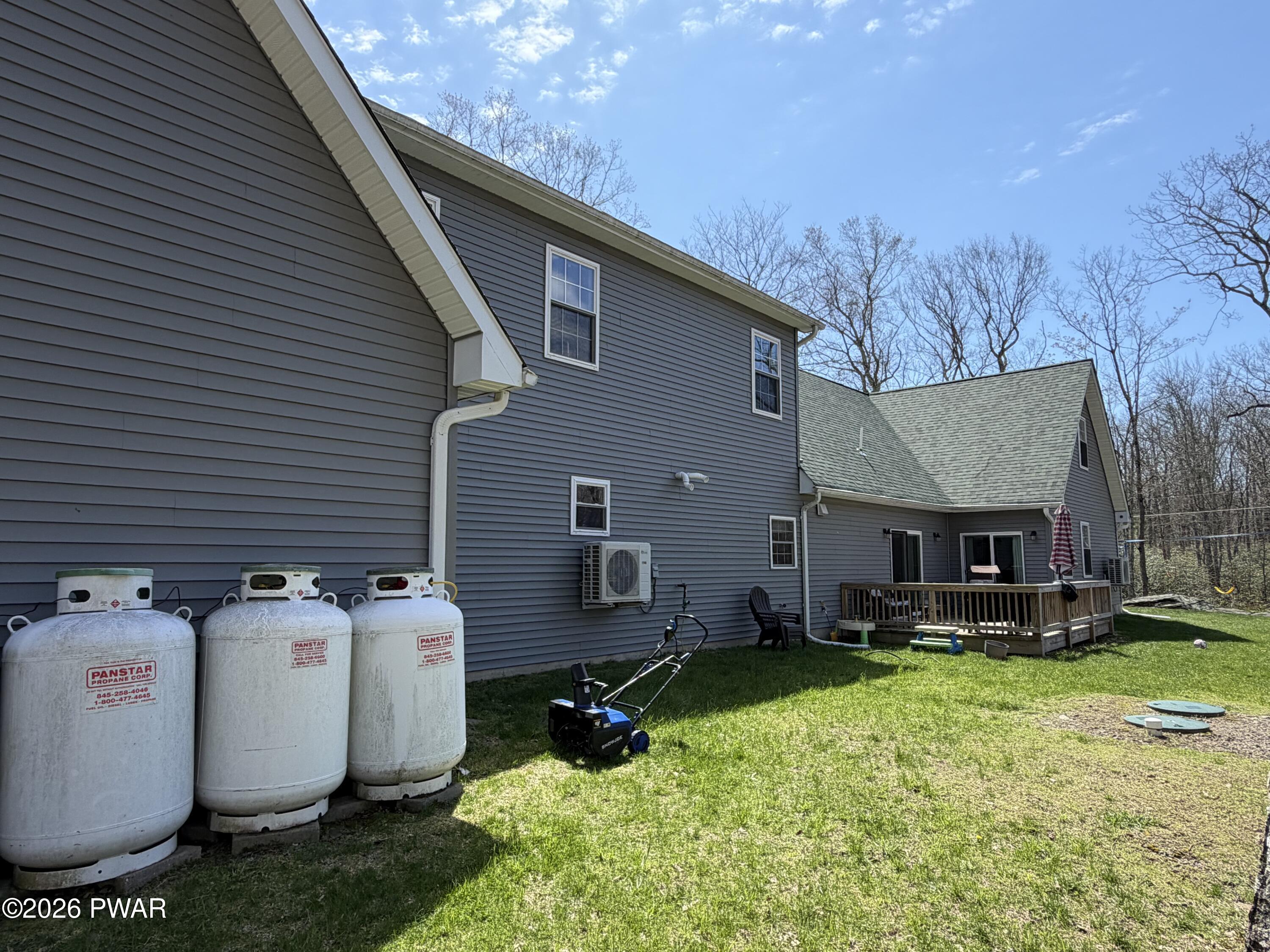 801 Maple Ridge Court Hawley, PA 18428 - Photo 5 of 55 a view of a house with backyard