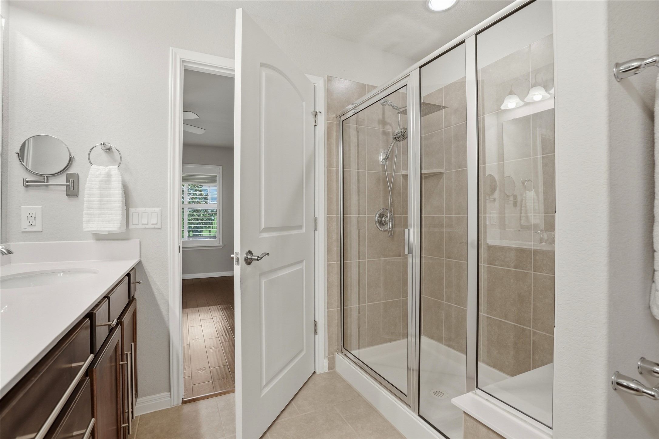 821 Hamilton Lane Georgetown, TX 78633 - Photo 14 of 38 Bathroom featuring a large glass-enclosed shower with tile surround