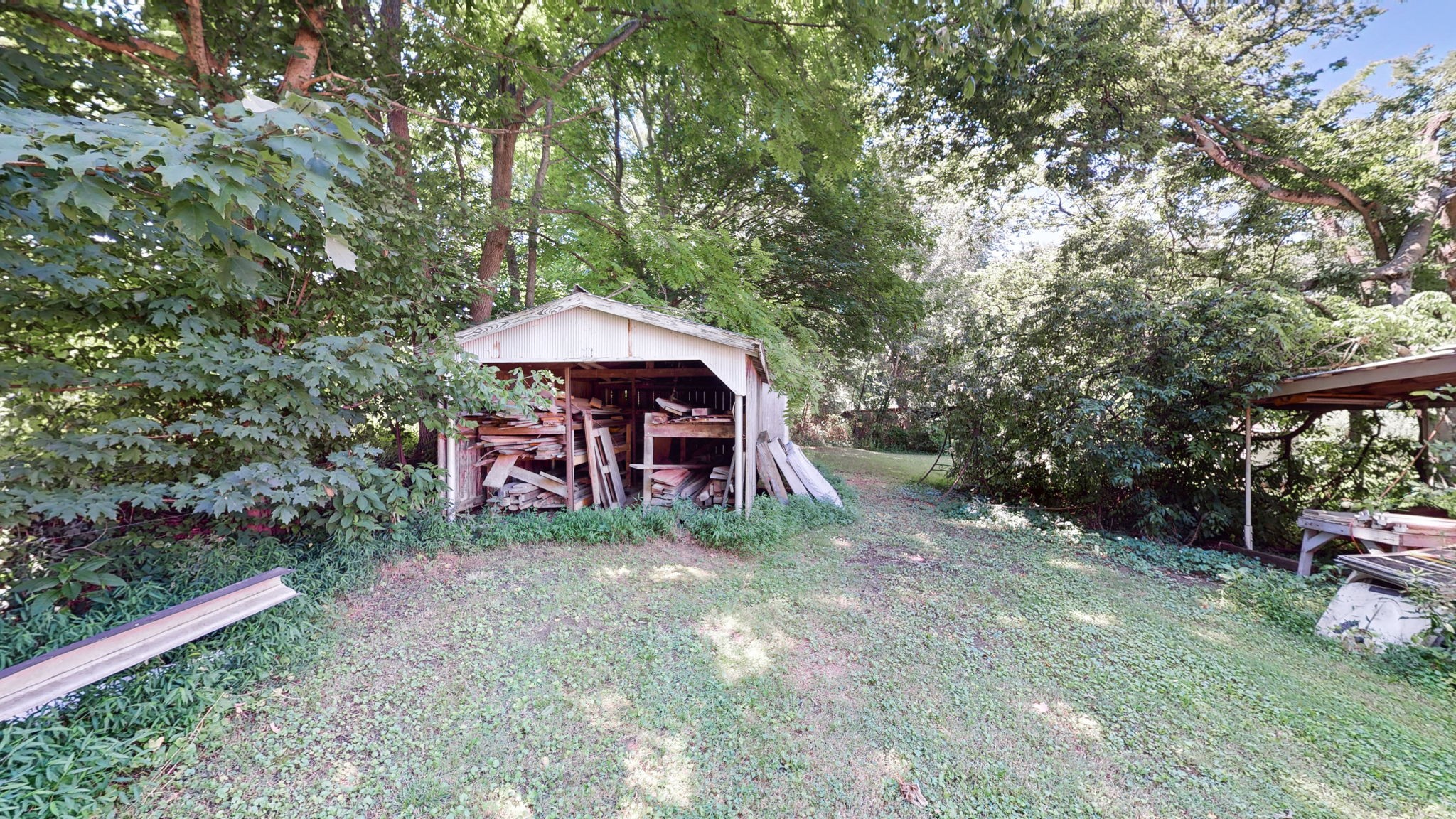 4563 Corbin Sneed Road Springfield, TN 37172 - Photo 25 of 40 a view of a house with backyard porch and garden