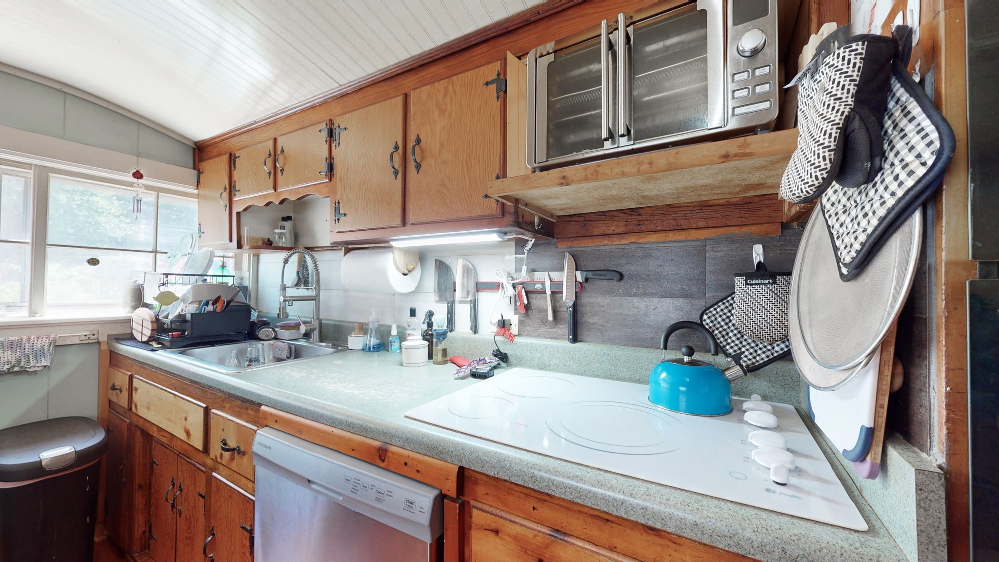 4563 Corbin Sneed Road Springfield, TN 37172 - Photo 6 of 40 a kitchen with sink a stove and cabinets