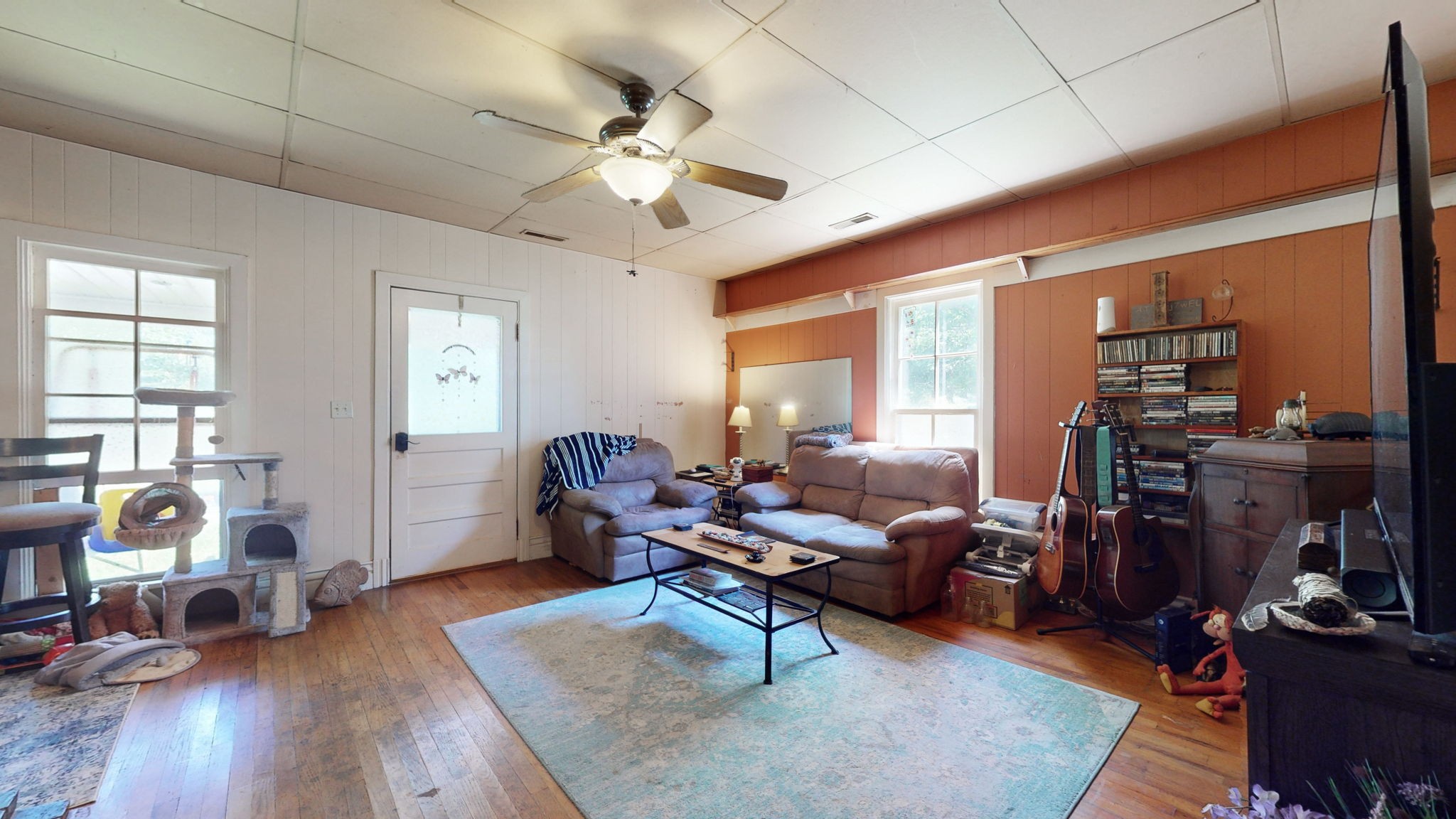 4563 Corbin Sneed Road Springfield, TN 37172 - Photo 8 of 40 a living room with furniture a flat screen tv and a window