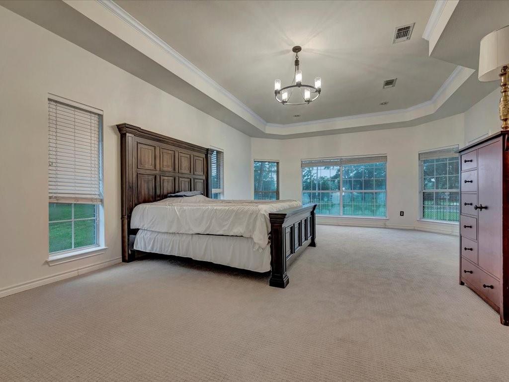 206 Cascade Court Lufkin, TX 75901 - Photo 16 of 29 a bedroom with a bed couch and window