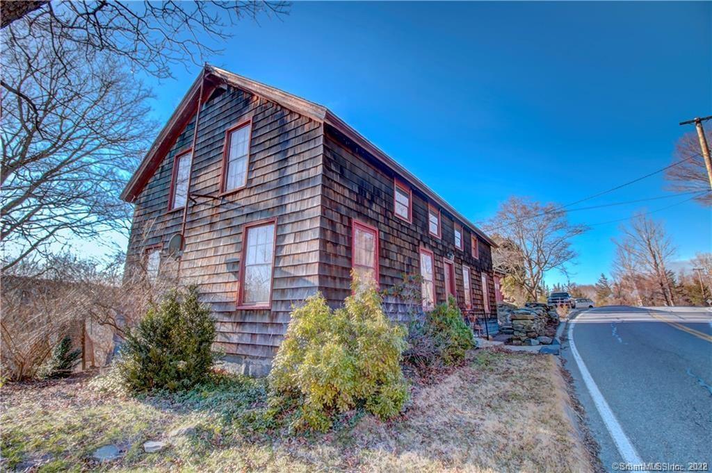 1011 Shewville Road Ledyard, CT 06339 - Photo 1 of 1 a view of a house with a yard